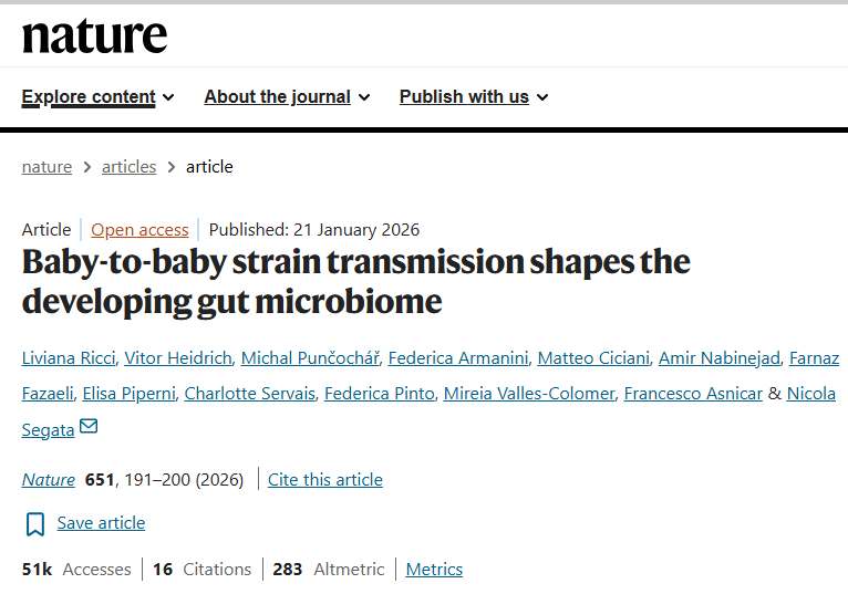 Baby-to-baby strain transmission shapes the developing gut microbiome