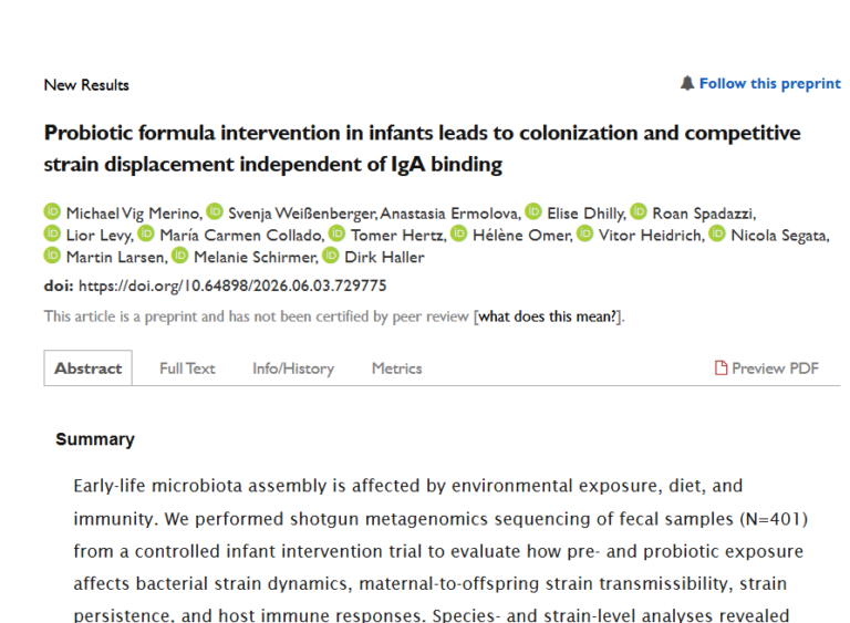 Probiotic formula intervention in infants leads to colonization and competitive strain displacement independent of IgA binding